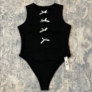 Black Cut Out Bodysuit with White Bows